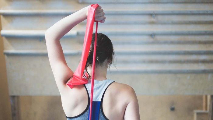 individual stretching with a resistance band