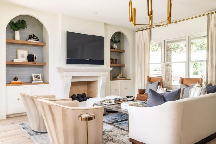 a vibrant living room featuring arched cabinetry