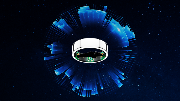 Oura ring surrounded by advanced technology
