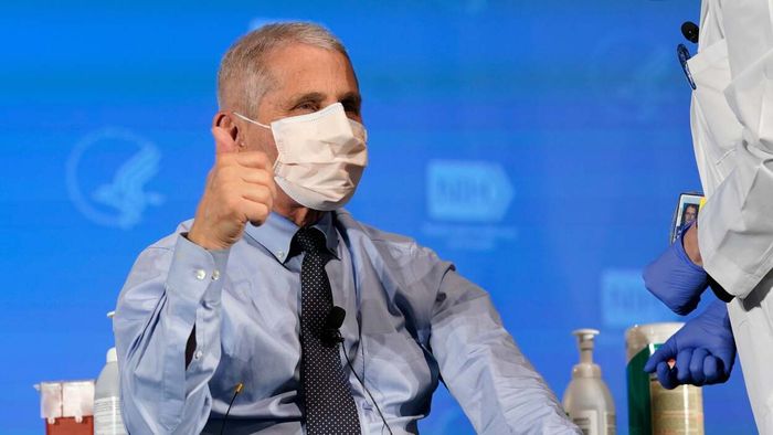 Dr. Fauci shows his support with a thumbs-up at a vaccination site