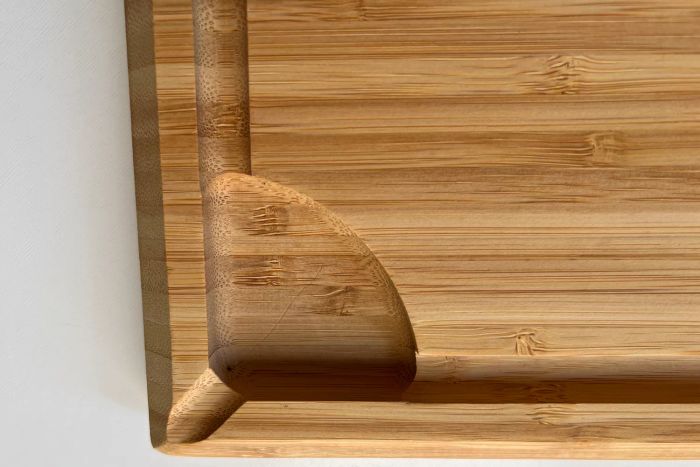 The juice corner on the Food52 Five Two The Happy Medium Bamboo Double-Sided Cutting Board