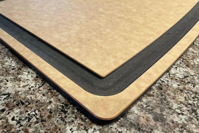 A detailed view of the corner on the Epicurean 17.5 x 13 Inch Gourmet Series Groove Cutting Board