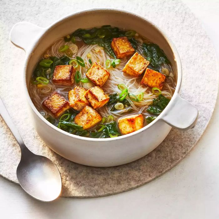 This crispy tofu and rice noodle soup demonstrates that tofu dishes can rival—or even surpass—the flavor of meat-based recipes.