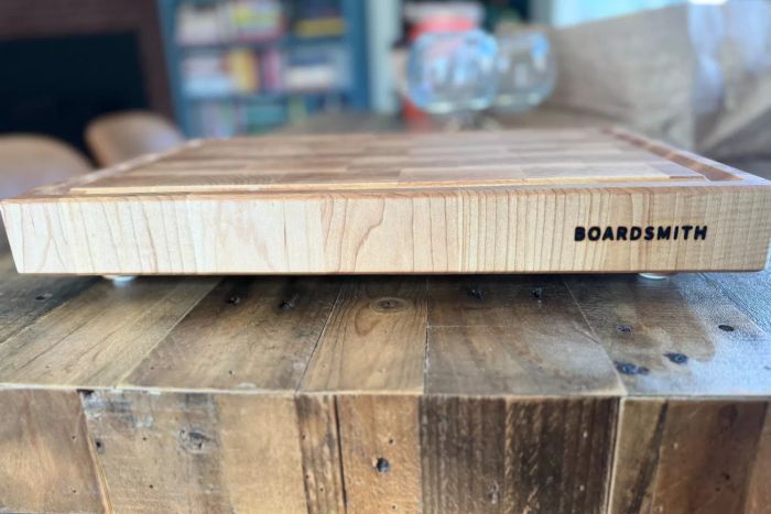 The logo displayed on the side of The Boardsmith Maple End-Grain Cutting Board
