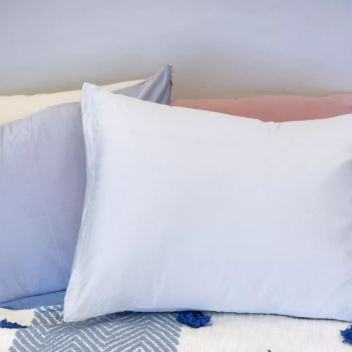 Silk Pillowcases displayed on a bed