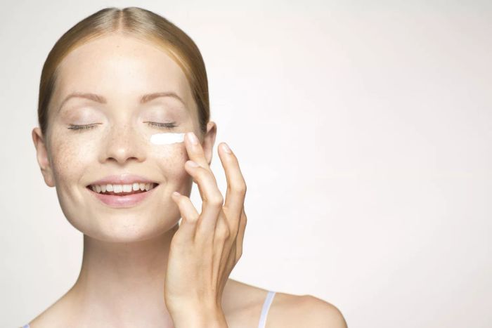 Woman Applying Anti-Aging Product