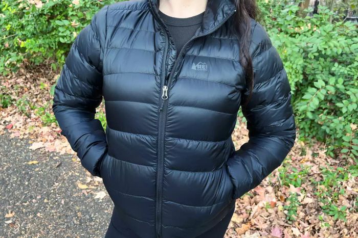 A model showcases the REI Co-op Women's 650 Down Jacket 2.0