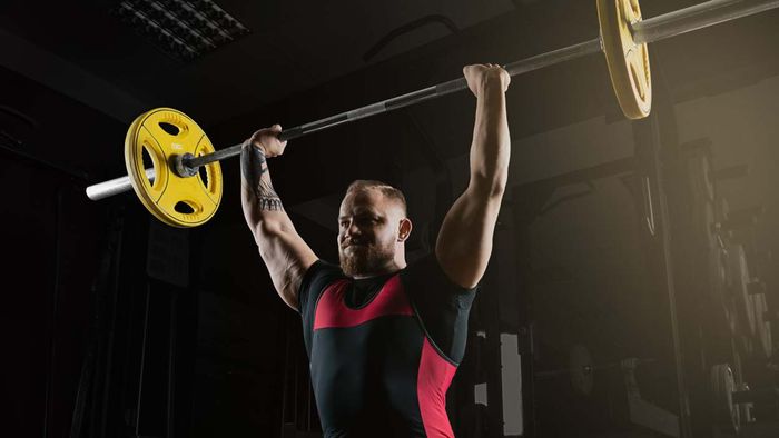 What Sets a Strict Press Apart from a Push Press?