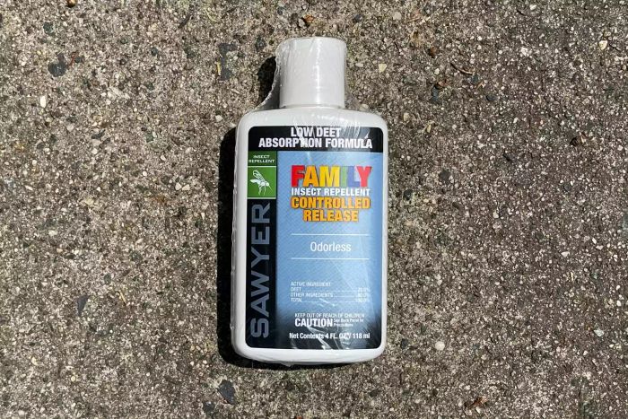 Sawyer Products Controlled Release Insect Repellent (20% DEET) shown on a concrete surface
