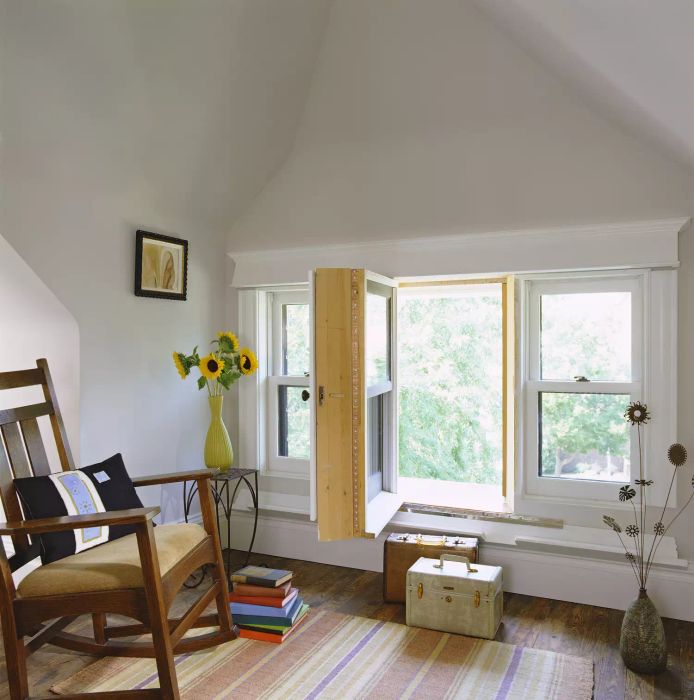 Rocking Chair by Open Attic Window