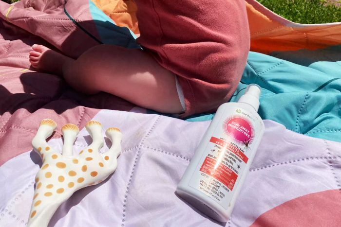 EarthKind Stay Away Mosquitoes Insect Repellent (20% Picaridin) shown on a rug