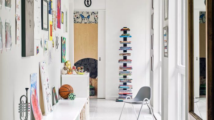 Space of the Week, Hallway Kids Zone with white cubbies and artwork on wall