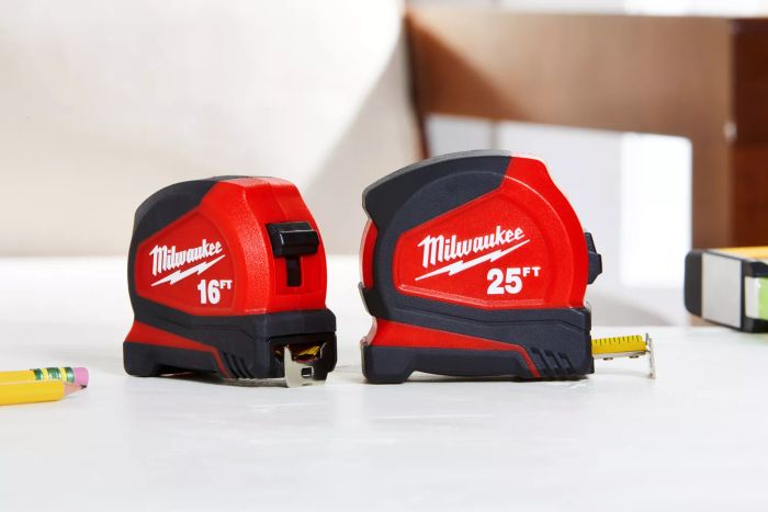 Milwaukee Compact Tape Measures arranged on a white desk