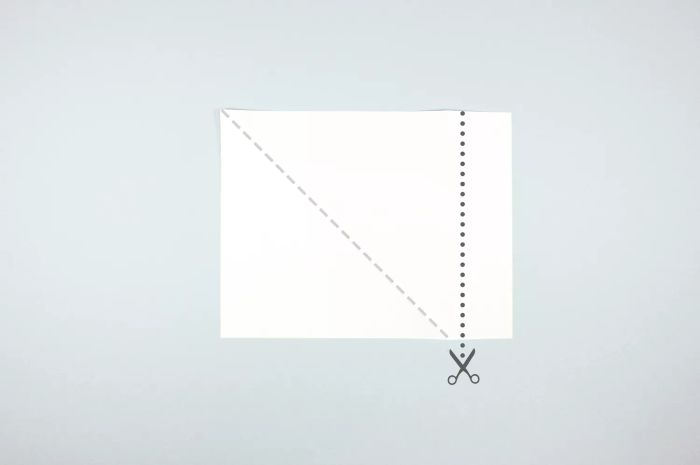 Visual guide demonstrating the process of cutting a sheet of paper into a square shape