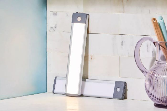 Lepotec LED Motion Sensor Cabinet Light positioned against a kitchen backsplash