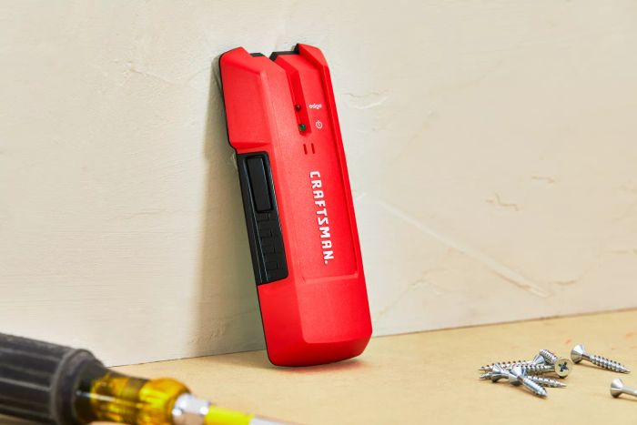 Craftsman 3/4-Inch Depth Stud Finder shown in use against a wall