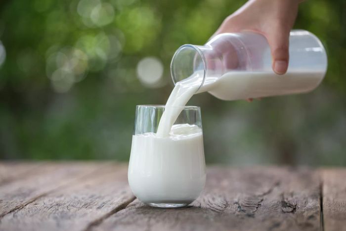 pouring cow milk