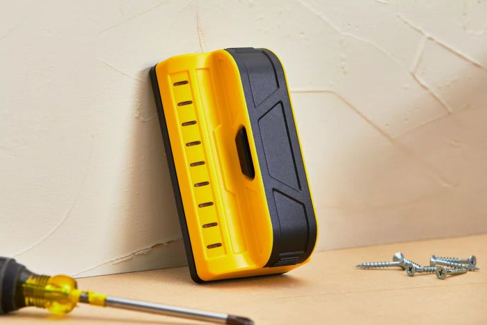 Franklin Sensors ProSensor M90 Professional Stud Finder shown in use against a wall