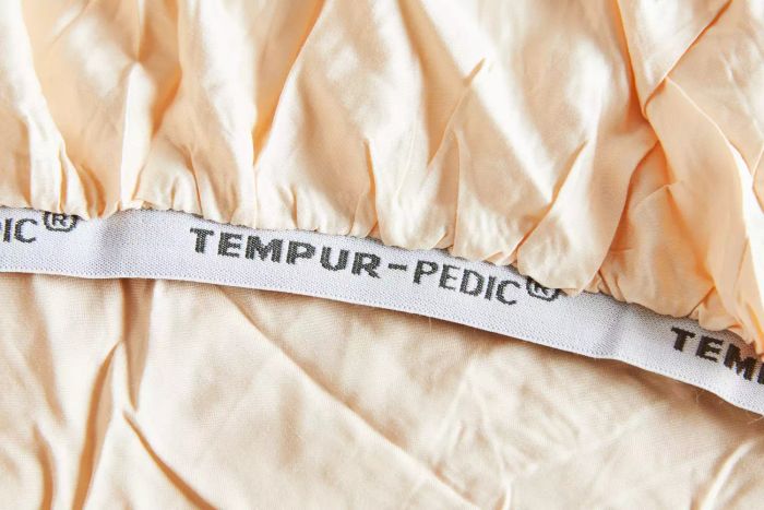 A detailed view of the logo stitched on the seam of the Tempur-Pedic 400 Thread Count Cool Luxury Sheet Set