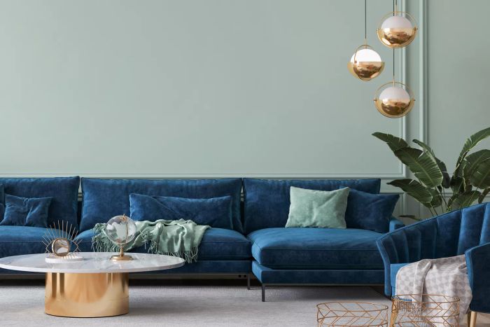 navy and sage toned living room