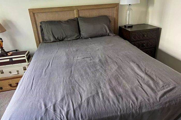 The Sheets & Giggles Eucalyptus Lyocell Sheets Set laid out on a bed