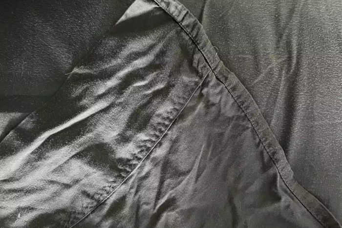 The corner of the fitted sheet from the Sheets & Giggles Eucalyptus Lyocell Sheets Set