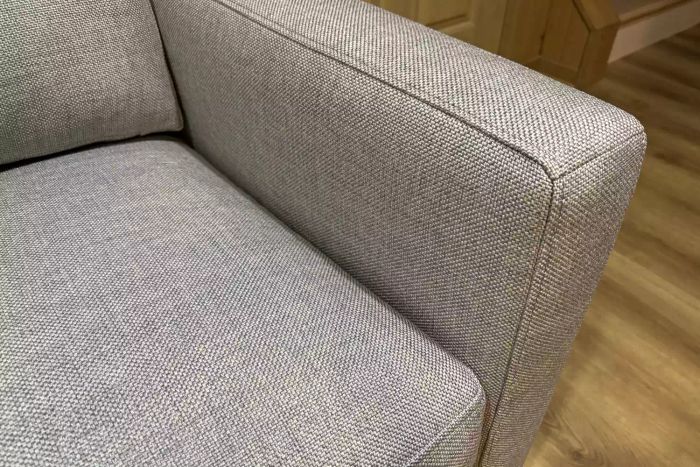 The armrest of the Crate & Barrel Barrett II 3-Seat Queen Sleeper