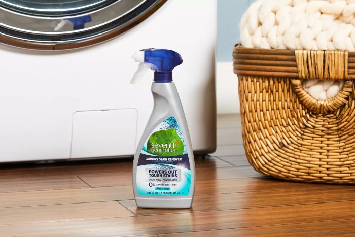 Seventh Generation Laundry Stain Remover placed on a wooden floor