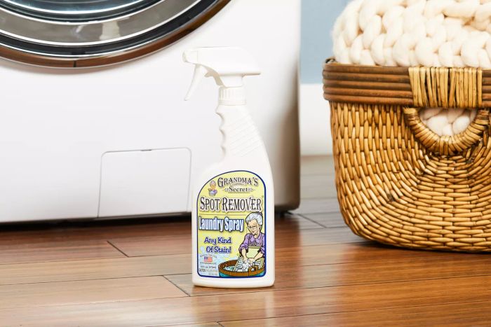 Grandma's Secret Spot Remover Laundry Spray displayed on a wooden floor