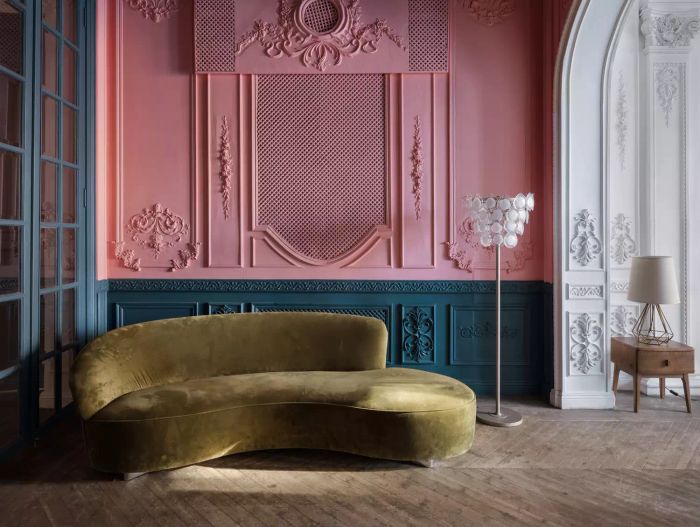 room with curved green velvet couch
