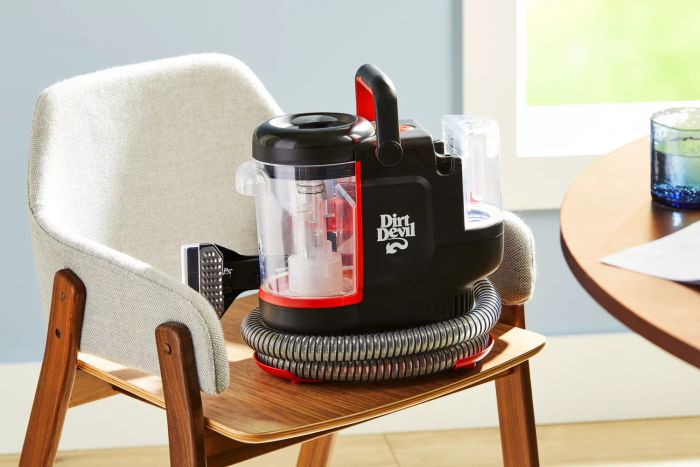 A Dirt Devil Portable Spot Cleaner showcased on a chair