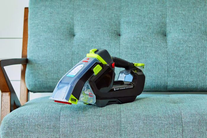 Bissell Pet Stain Eraser Plus showcased on a couch