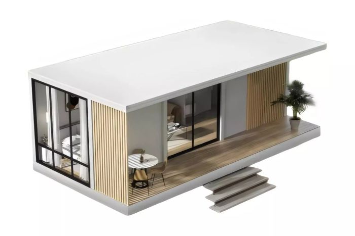 prefabricated compact home featuring a bathroom and kitchen