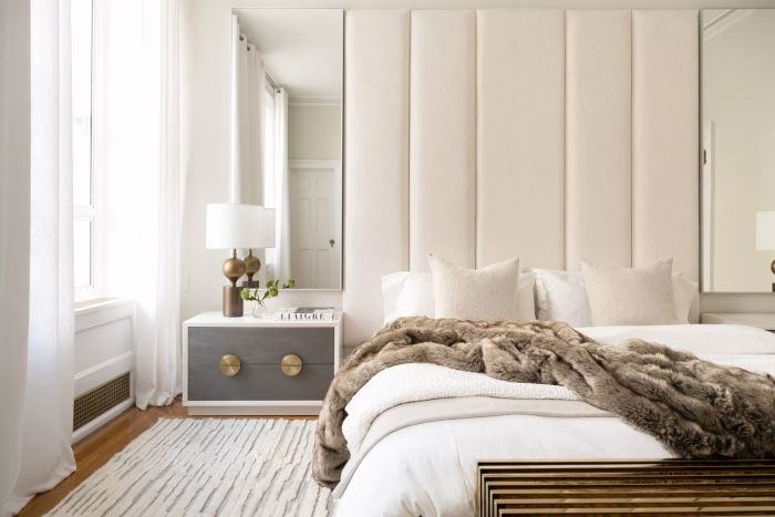 A bedroom featuring mirrors
