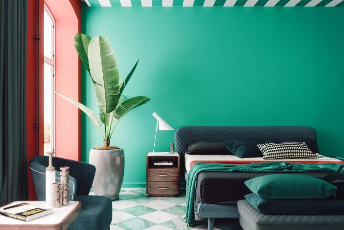 bedroom with pink and green tones