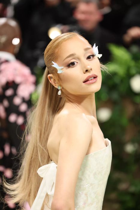 Ariana Grande showcasing a dark honey blonde hairstyle at The 2024 Met Gala