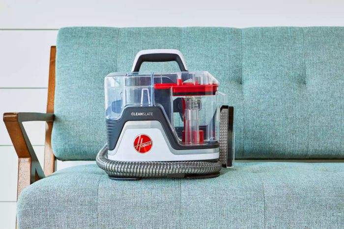 Hoover CleanSlate XL Deep Clean Spot Cleaner showcased on a teal couch