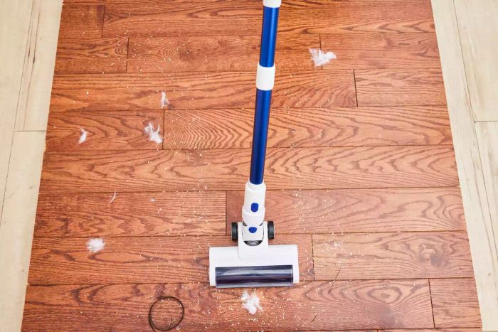 Britech Cordless Lightweight Stick Vacuum cleaning a wooden floor