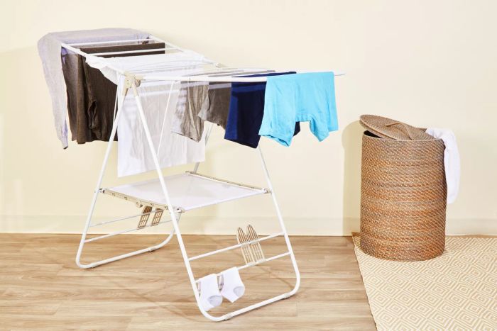 Honey-Can-Do Heavy Duty Gullwing Drying Rack placed on wooden flooring