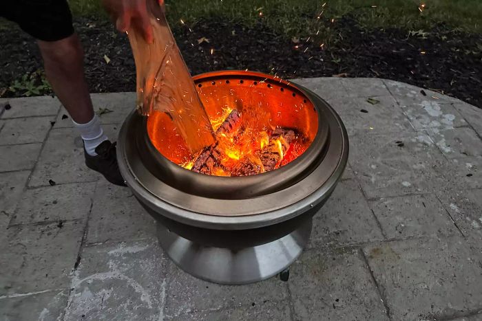 Wood burning inside the Cuisinart COH-800 Cleanburn Smokeless 24 Inch Fire Pit