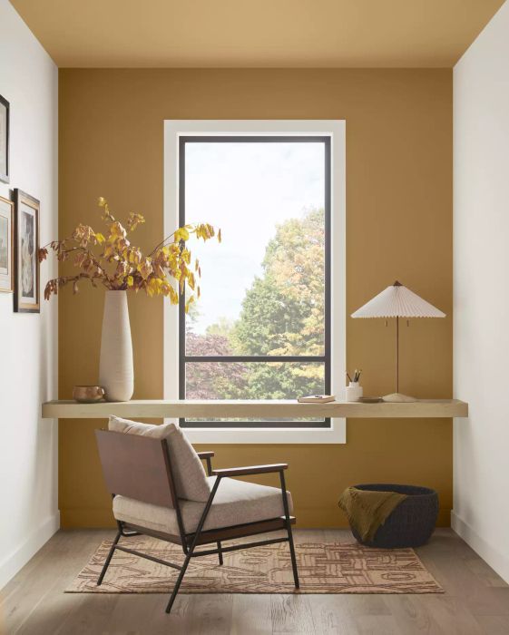 A room featuring a deep golden yellow wall