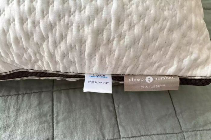 The tags attached to the side of the Sleep Number ComfortFit Pillow