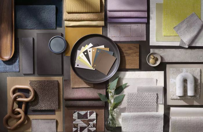 A top-down view of various fabric swatches showcasing a spectrum of colors