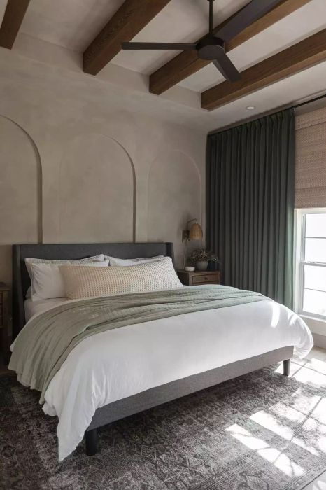 Bedroom with arched accent walls