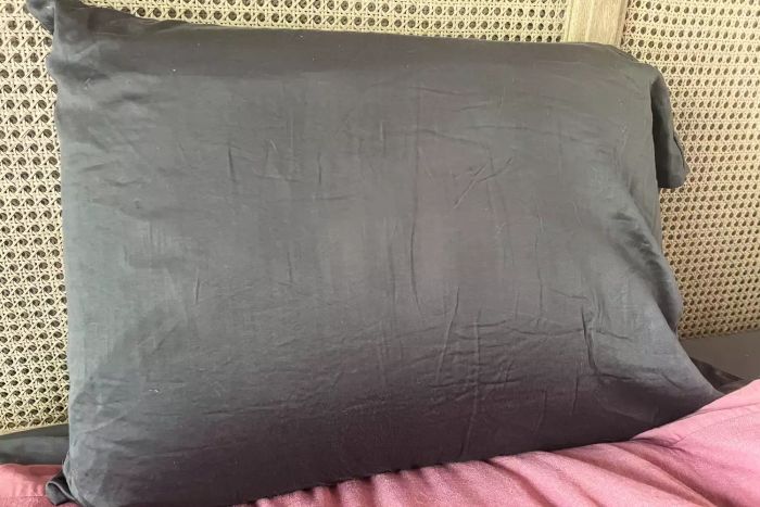 The Purple DreamLayer Pillow encased in a pillowcase