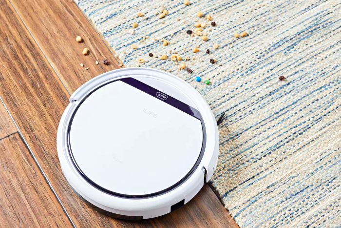 The ILIFE V3s Pro Robot Vacuum Cleaner is adept at cleaning trail mix scattered on both wood floors and carpets.