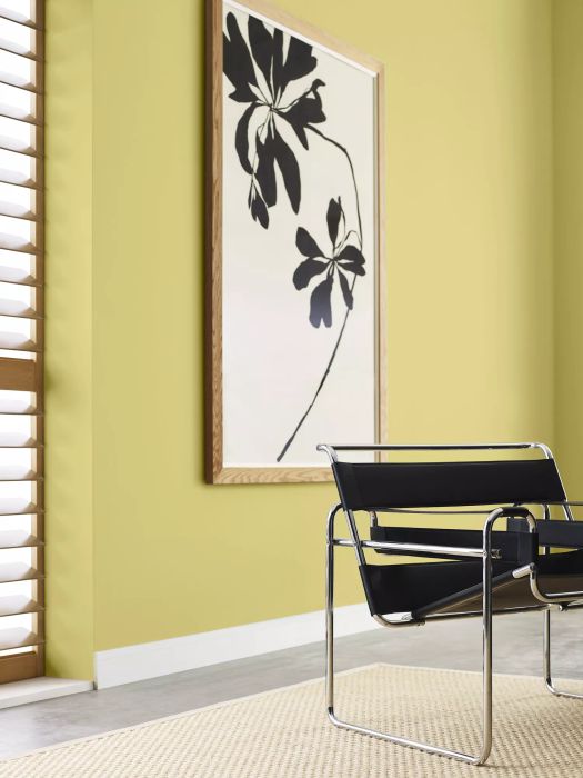 A wall painted in a striking chartreuse color
