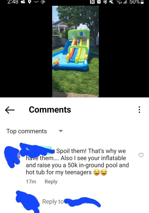 On a video showcasing children enjoying an inflatable slide, the ex comments, "While you have an inflatable, I’ve upgraded to a 50,000 in-ground pool and hot tub for my teens," accompanied by laughing emojis.
