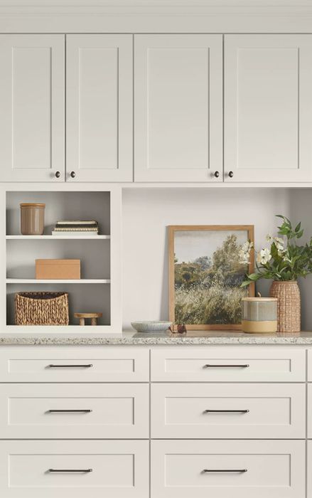 Kitchen cabinets painted in a soft, off-white hue
