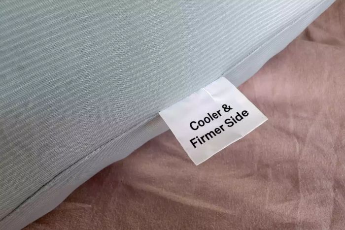 A label on the Coop EdenCool+ Adjustable Pillow reading